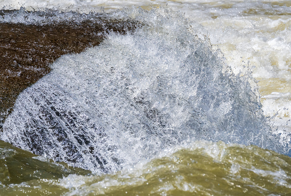 Frozen motion of raging water flowing over Valley Falls by Steve Heap