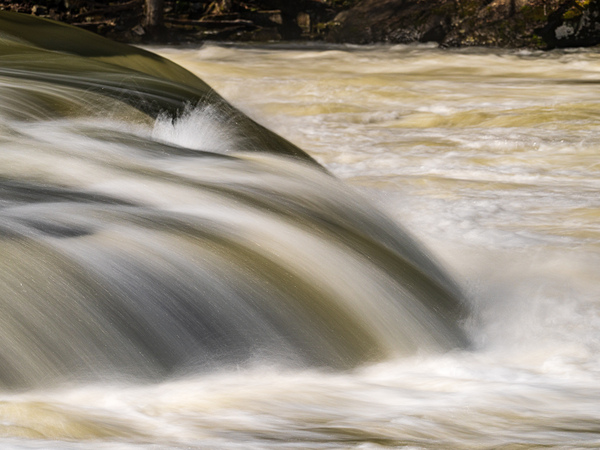 Long exposure of raging water flowing over Valley Falls by Steve Heap
