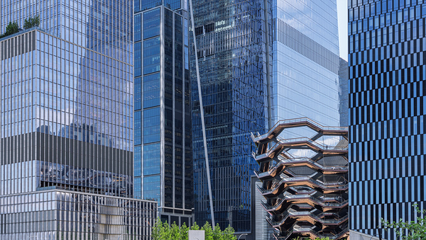 Tall office and apartment buidlings above Hudson Yards in New Yo by Steve Heap