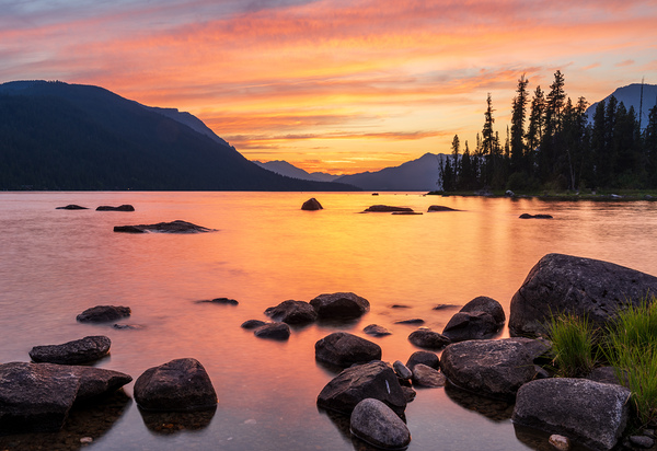 Vibrant sunset over Lake Wenatchee in the Cascade Mountains WA by Steve Heap