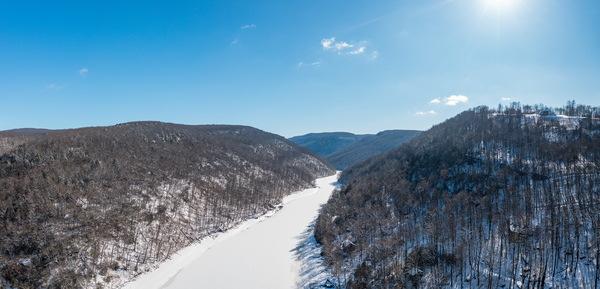 Aerial view up the frozen Cheat River in Morgantown WV by Steve Heap