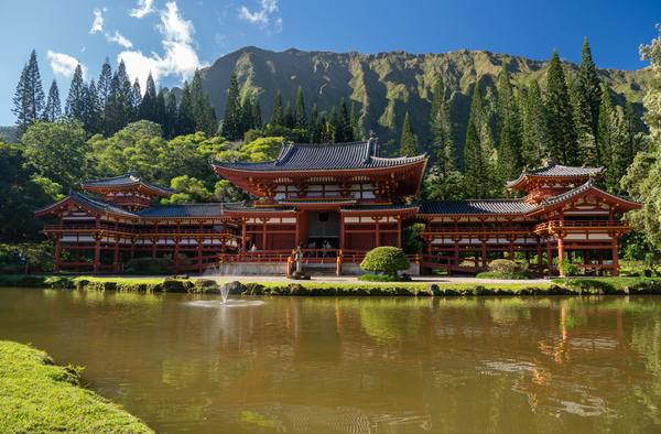 Byodo In buddhist temple under the tall mountain range by Steve Heap