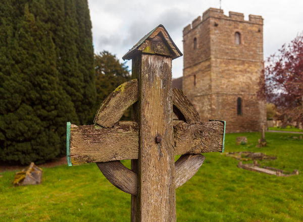 Old wooden cross in Stokesay graveyard by Steve Heap