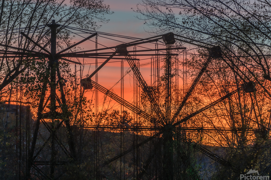 Ferris Wheel ride at abandoned funfair   Print