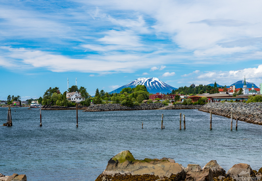 Mt Edgecumbe rises about the small town of Sitka in Alaska  Print