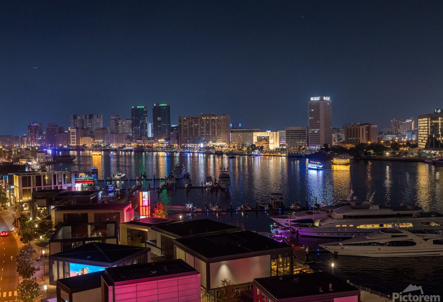 The Creek by Bur Dubai and Al Seef at night with abra boat tours  Print