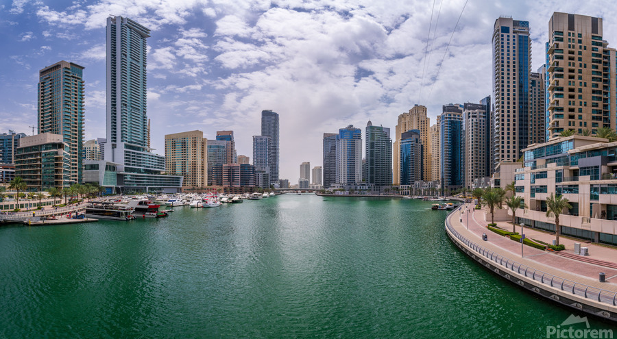 Modern buildings crowd the waterfront at Dubai Marina UAE  Print