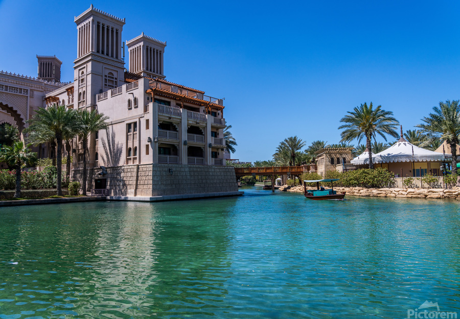 Wooden bridge over waterway in Souk Madinat Junction mall  Print