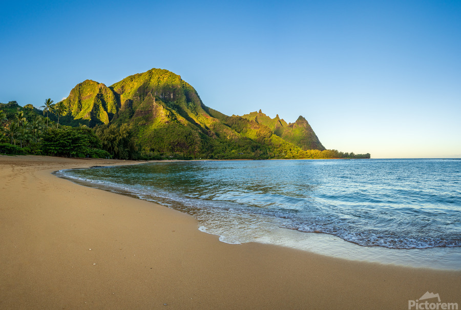 Early morning sunrise over Tunnels Beach on Kauai in Hawaii  Print