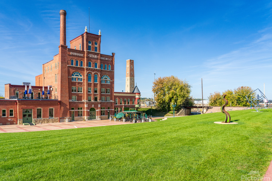Historic Dubuque Star Brewery alongside Mississippi river  Print
