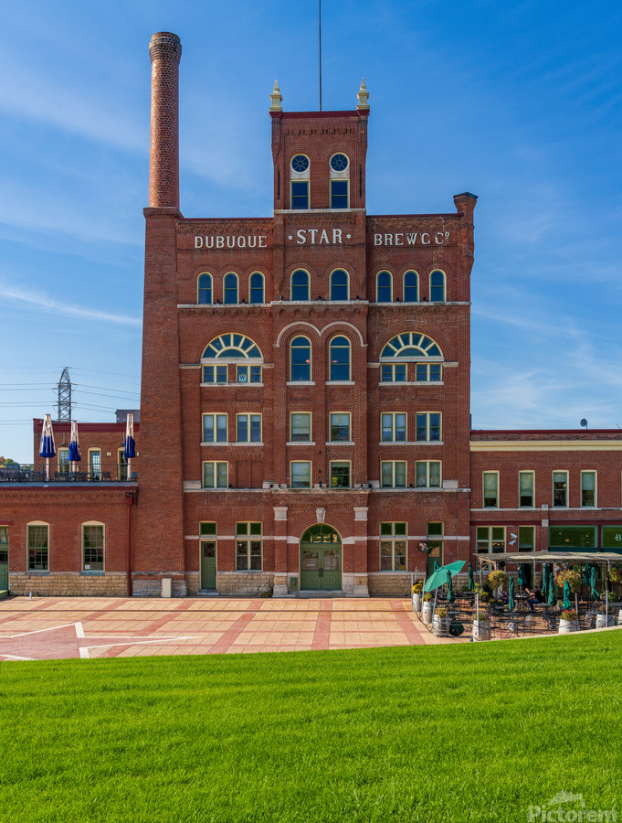 Historic Dubuque Star Brewery alongside Mississippi river  Print