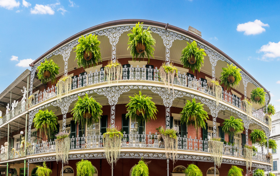 Traditional wrought iron balcony on Royal Street New Orleans hou  Print