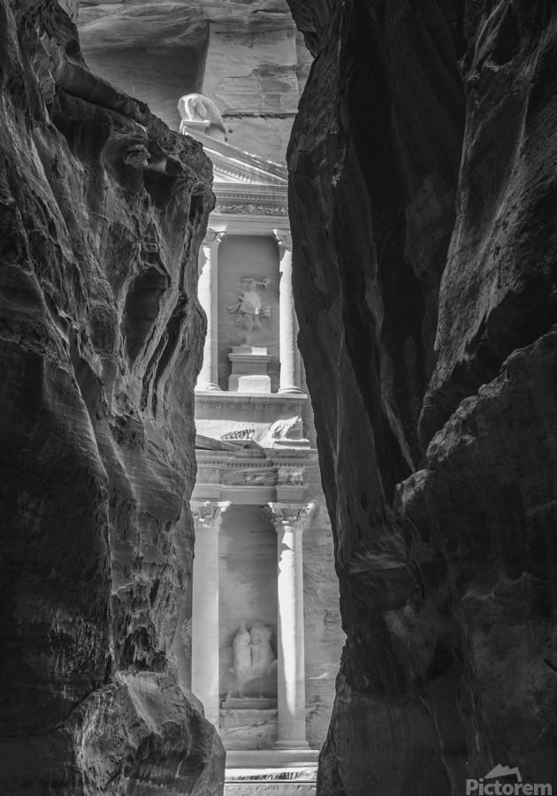 Monochrome Petra Treasury building facade seen through narrow go  Print
