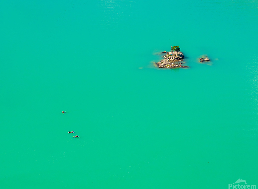 Three paddleboards float away from island in Diablo Lake in Nort  Print