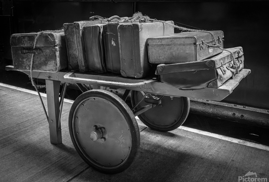 Historic antique luggage cart with retro leather suitcases and t  Print