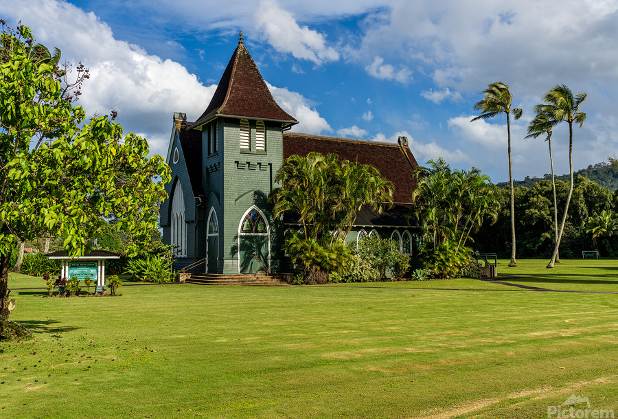 Waioli Huiia Church stands in Hanalei Kauai with the majestic   Print