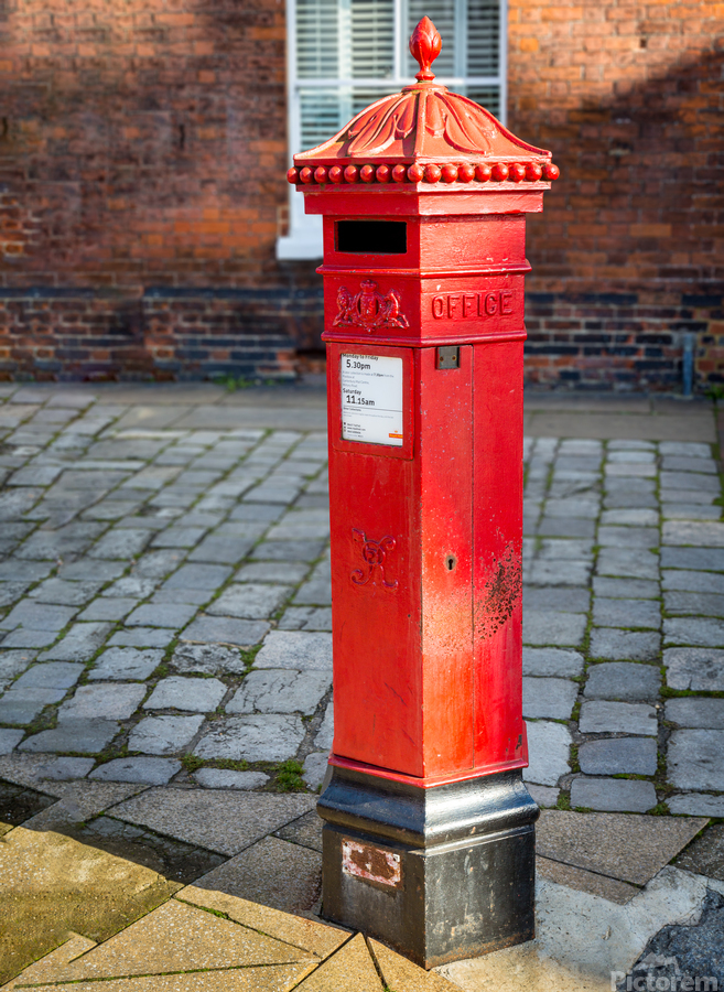 Victoria era red post office mailbox in street  Print