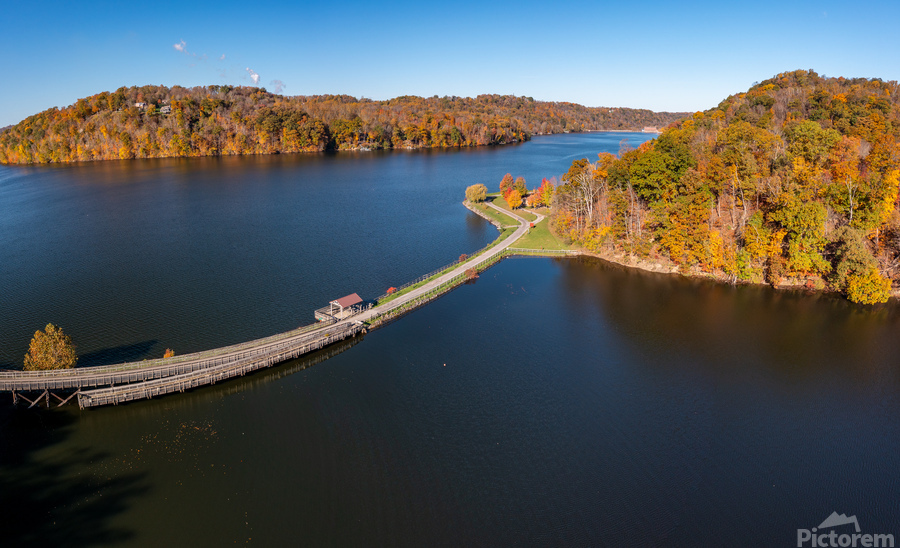 Fall colors surround the lake and trail at Cheat Lake Park  Print