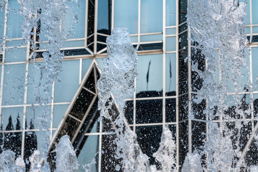 Frozen water of fountain by modern architecture in Pittsburgh  Print