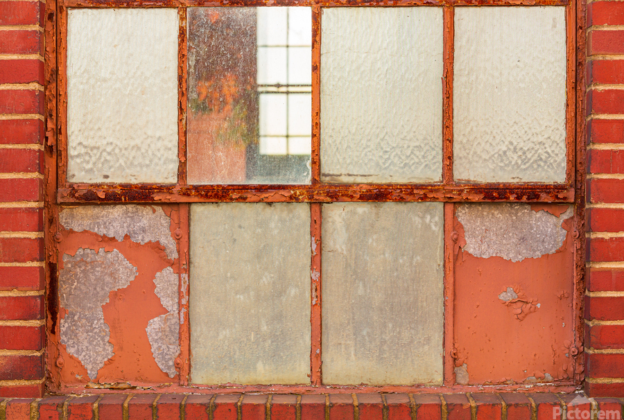 Old rusty window in warehouse painted red and orange  Print