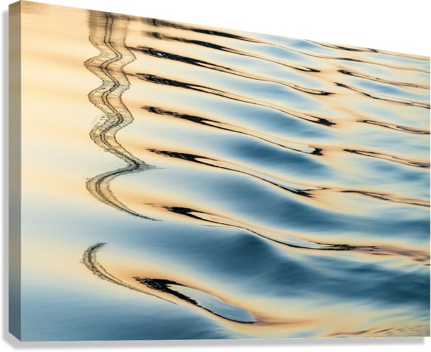 Reflections of electricity pylon at sunset in gentle river rippl Canvas Print