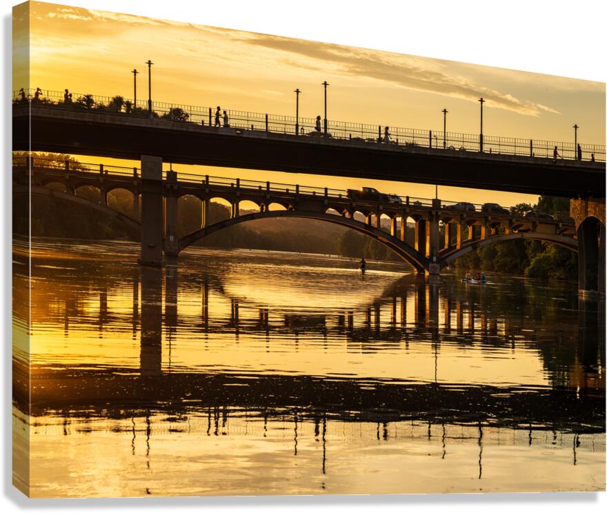 The Pfluger pedestrian bridge with the Lamar Boulevard bridge be Canvas Print