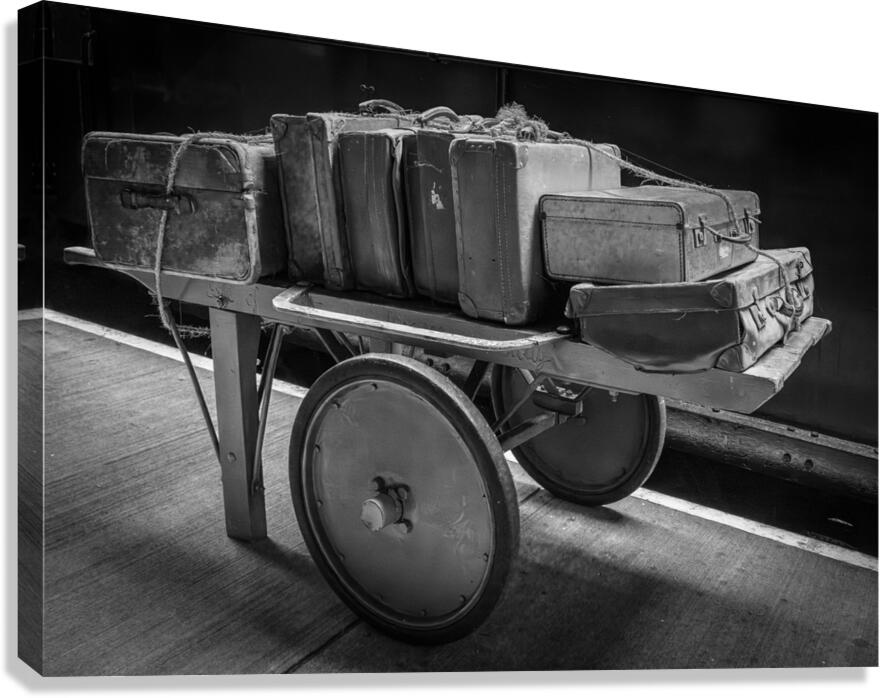 Historic antique luggage cart with retro leather suitcases and t Canvas Print