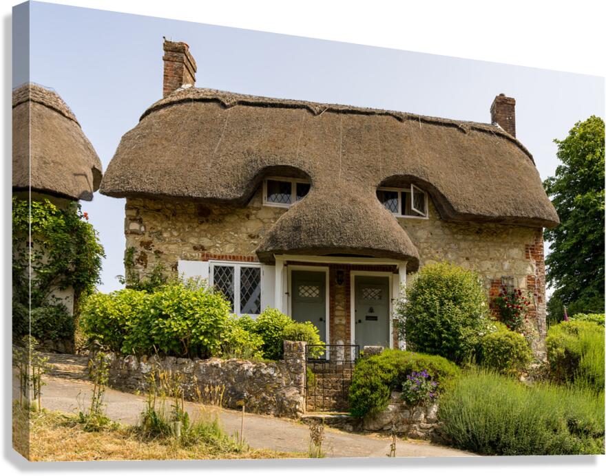 Pair of cute thatched cottages on hill in Godshill on the Isle o Canvas Print