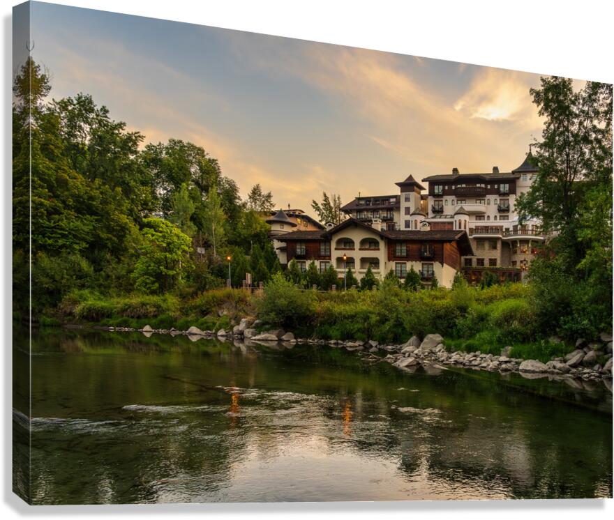 Hotel at dawn by River Wenatchee in Alpine German town of Leaven Canvas Print
