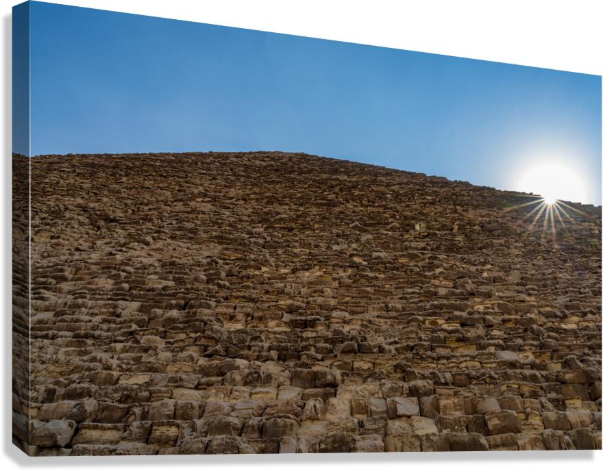 Great Pyramid of Giza with the sun flaring over the top edge Canvas Print
