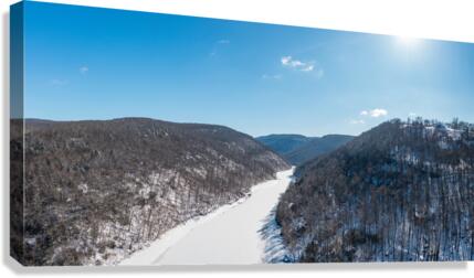 Aerial view up the frozen Cheat River in Morgantown WV  Canvas Print