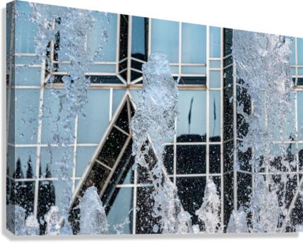 Frozen water of fountain by modern architecture in Pittsburgh  Canvas Print