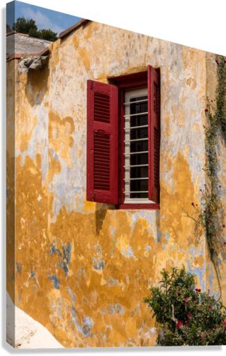Red shutters on window in Anafiotika in Athens  Canvas Print