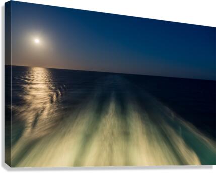 Moon over the wake of cruise ship travelling at speed  Canvas Print