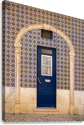Blue door in ceramic tiled home in Lisbon  Canvas Print