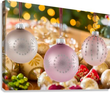 Three Christmas decorations on strings  Impression sur toile