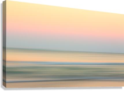 Sunrise over ocean with sideways pan  Canvas Print