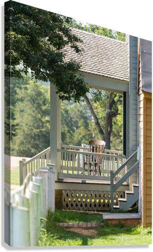 Wooden rocking chair on porch of old house  Impression sur toile