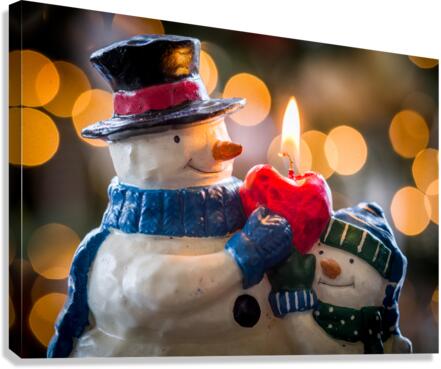 Christmas snowmen candle at xmas  Canvas Print