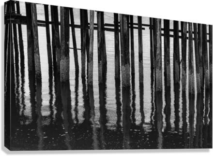 Black and whited wooden pier structure at Icy Strait Point  Canvas Print