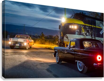 Two vintage cars racing to railroad crossing  Canvas Print