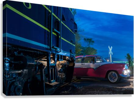Vintage car racing at railroad crossing Canvas Print