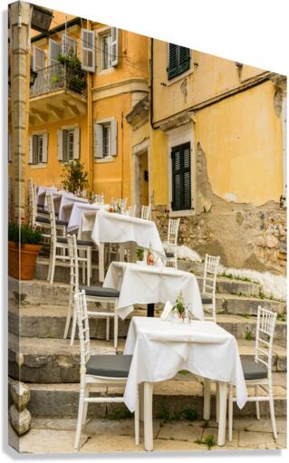 Small empty taverna in Old Town Corfu  Canvas Print