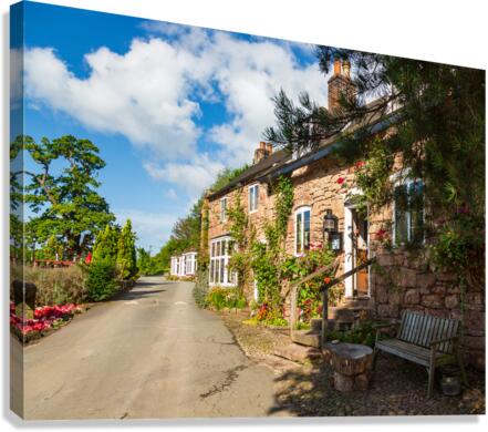 Ancient pub or restaurant on small road  Canvas Print