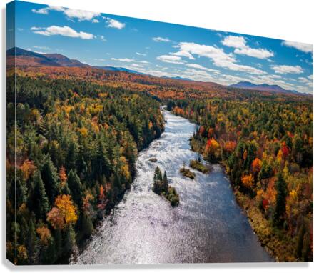 Saranac river flows through multi-colored fall landscape in Adir  Canvas Print