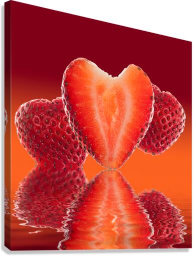 Fresh sliced strawberry in heart shape reflected  Canvas Print