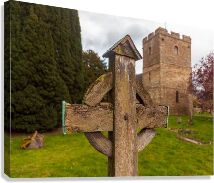 Old wooden cross in Stokesay graveyard  Canvas Print
