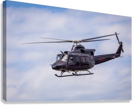 Bell 412 Helicopter coming in to land  Canvas Print