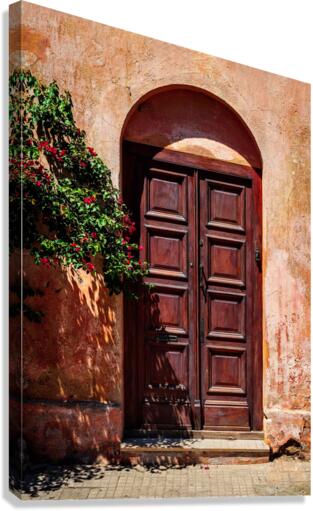 Wooden door in historical town of Colonia del Sacramento  Canvas Print