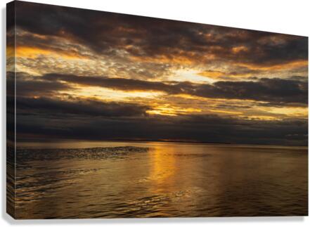 Golden sunset on a cruise on a calm Pacific ocean  Canvas Print